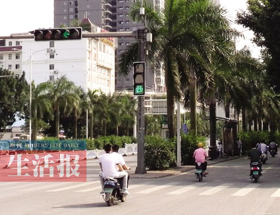 南宁交警试点管理非机动车 单车电动车有了信号灯
